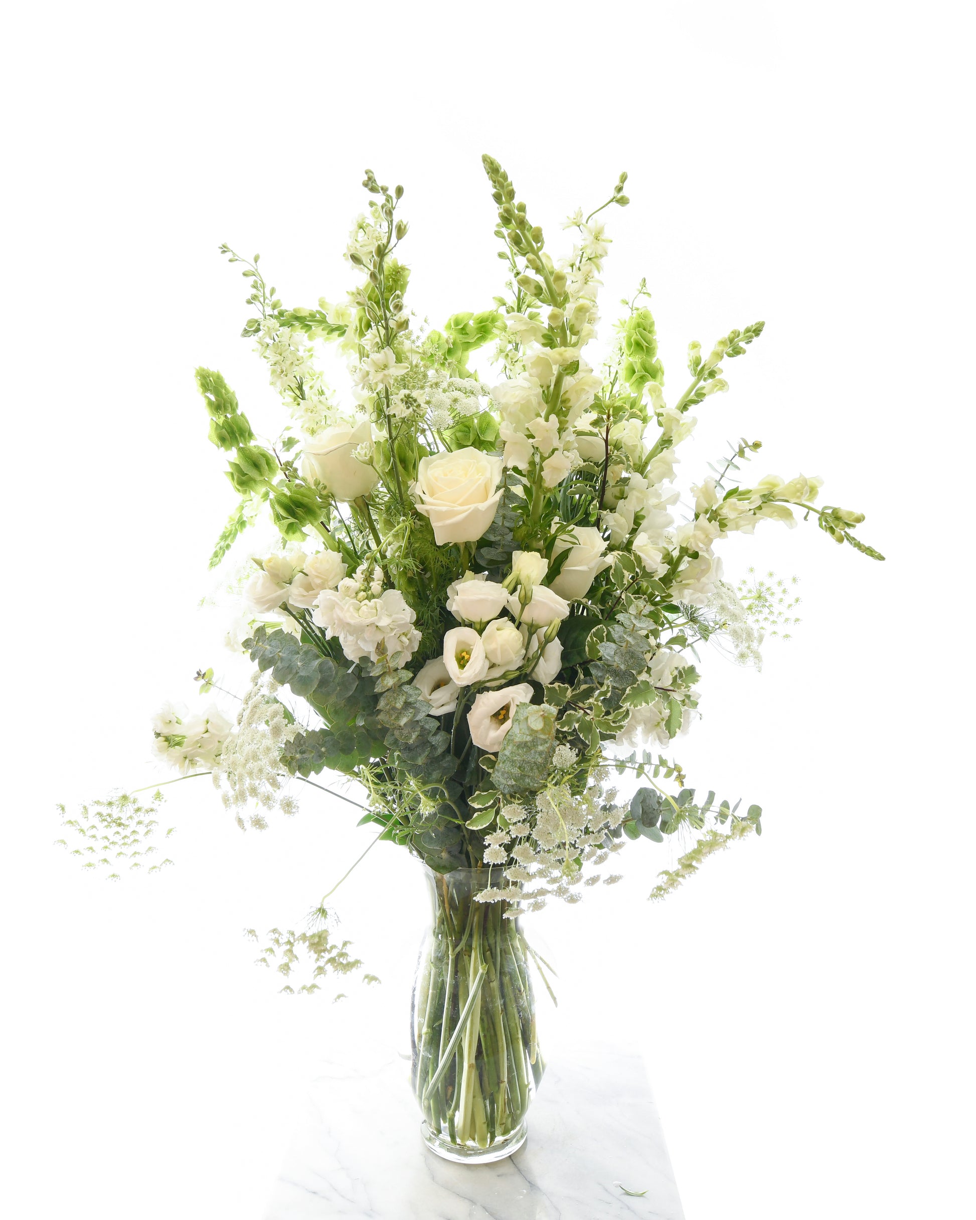 White rose and lily arrangement for sympathy – Brazos Floral Houston