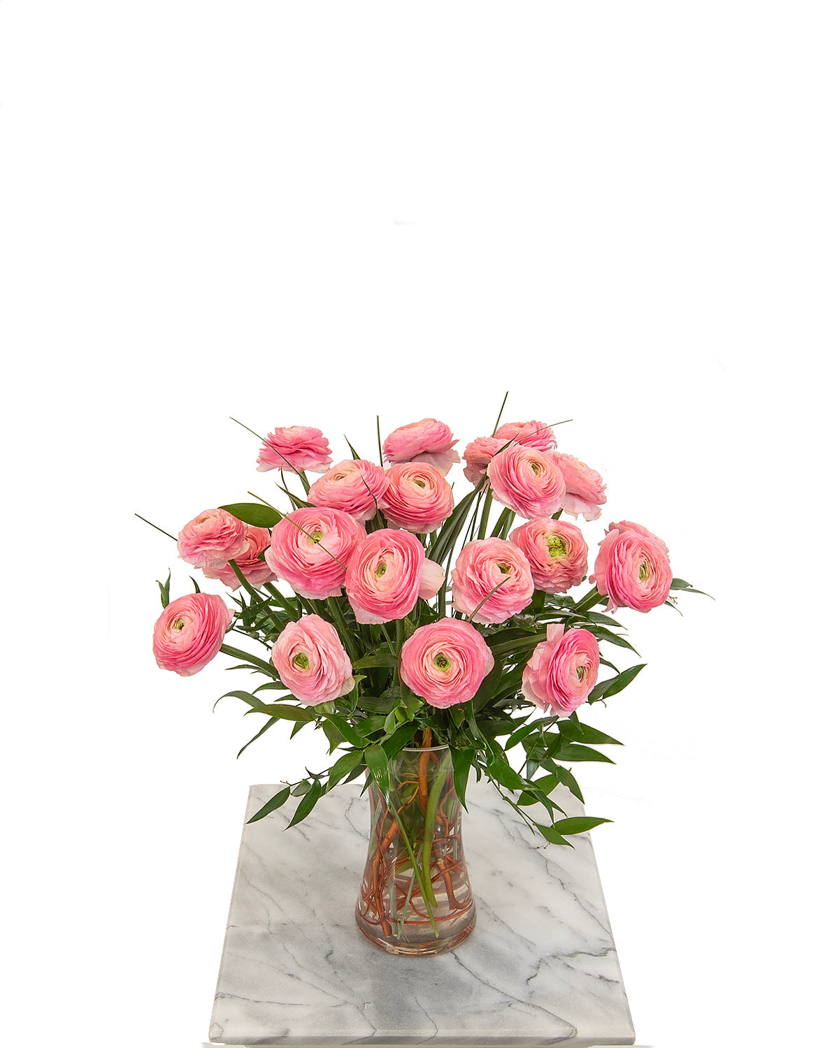 Pink ranunculus bouquet in glass vase for birthdays – Brazos Floral Houston
